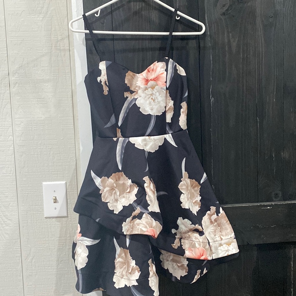 Gorgeous Black dress with floral placements